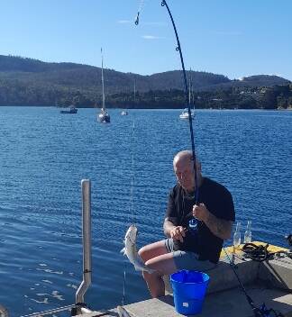 Kevin Knowles fishing during a recent trip to Tasmania.