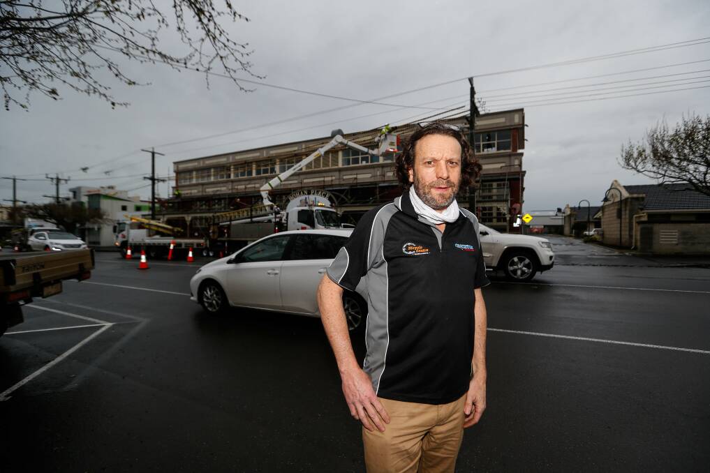 Blackout: Warrnambool businessman Steve Crichton was left relying on a generator after Powercor cut electricity supply to his shop on Saturday morning while scaffolding was put up at Koala childcare. Picture: Anthony Brady. 