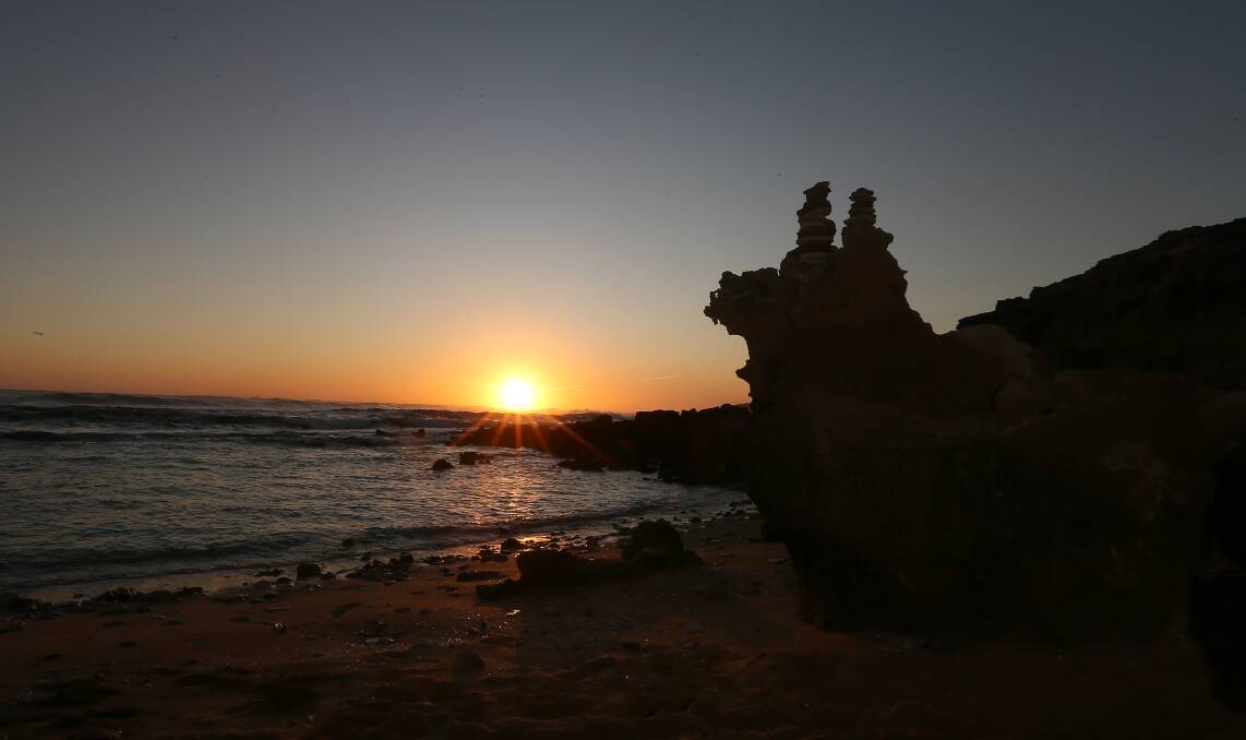 Sunset at Warrnambool's Shelly Beach on Sunday night. Picture: Mark Witte