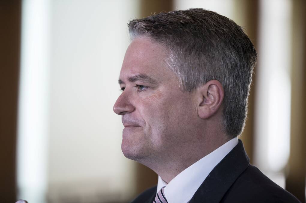 Tipping tightening: Finance Minister Mathias Cormann speaks to the media at Parliament House in Canberra.