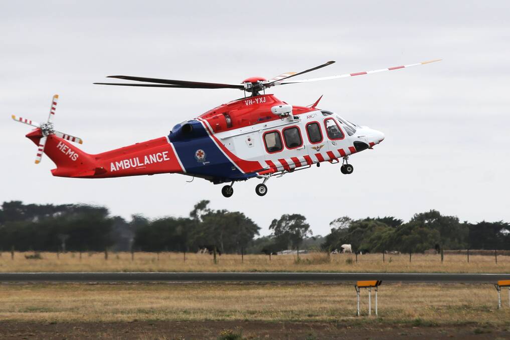 Worker pinned by leg in accident, freed by SES volunteers and flown to hospital
