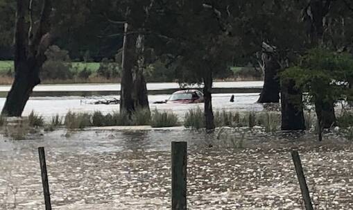 Driver lucky to survive, SES rescue man swept away