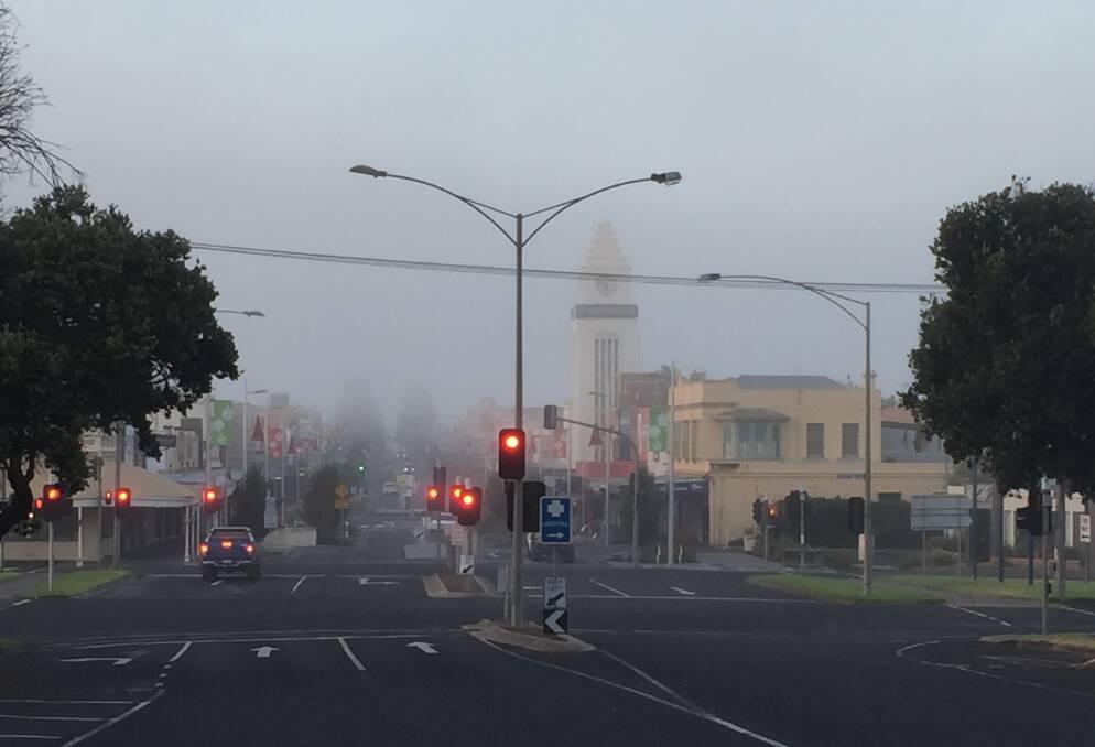 Foggy start: Looking south up Liebig Street in Warrnambool just before 7am.