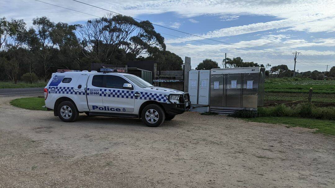 Busted: Police arrested the man at the Princes Highway site at Illowa late on Thursday afternoon and he was pleaced in the back of this divisional van.