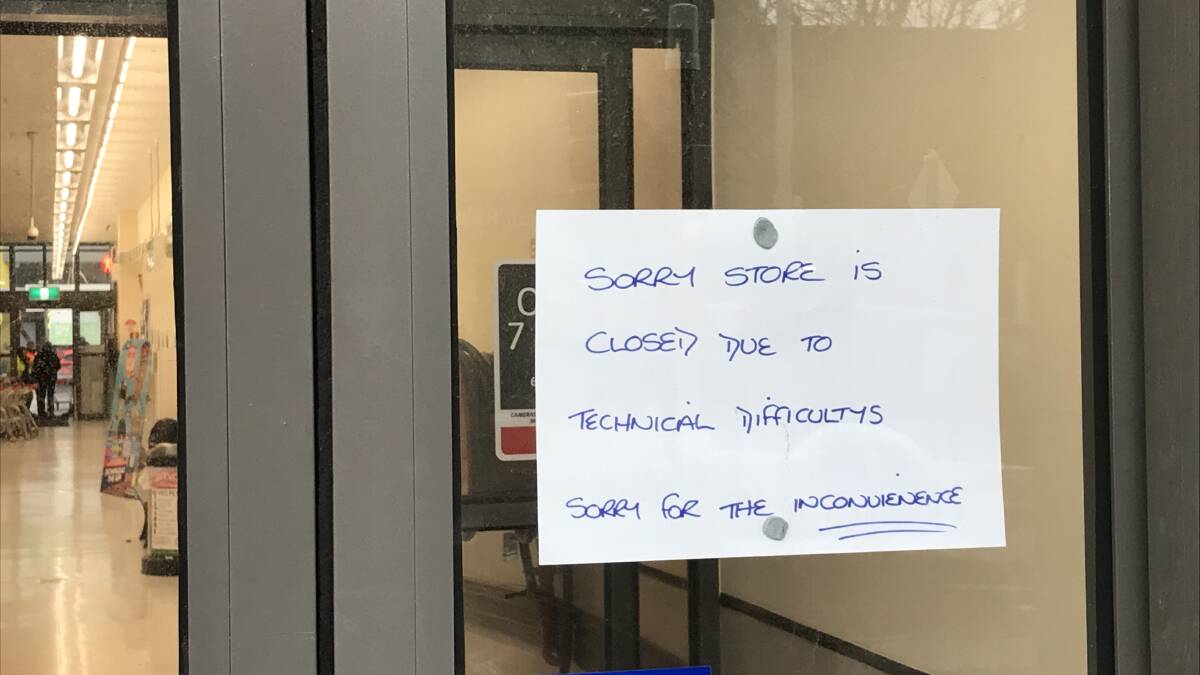 Closed: The sign alerting shoppers on the front door.