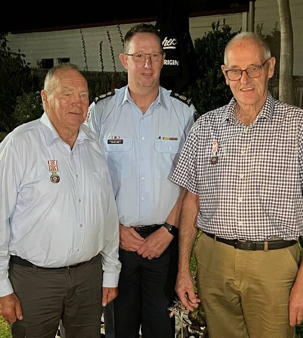 Recognised: Noel McKinnon (left) and David McKenzie were presented with their CFA life memberships by CFA deputy chief officer Rohan Luke on Wednesday night.