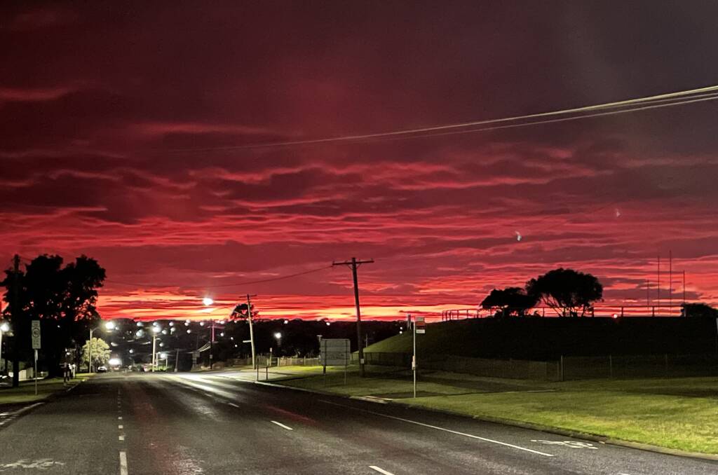 Sunrise warning: There was a bright red sky looking east over north Warrnambool this morning, an accurate predictor of rain ahead.