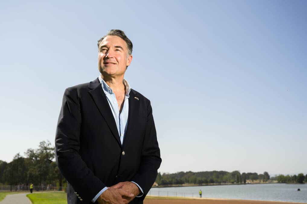 Top honour: Australian of The Year, Eye Surgeon James Muecke, poses for a portrait following the citizenship ceremony at Lake Burley Griffin on Sunday in Canberra.