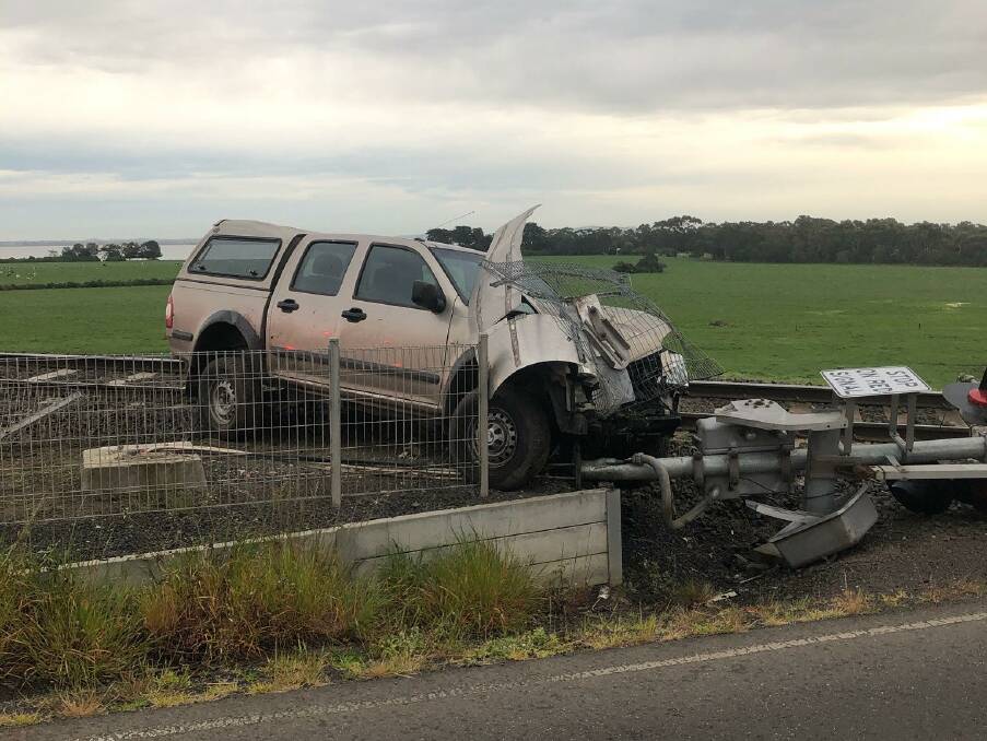Wrecked: A stolen Holden Rodeo was totalled in a single-vehicle collision with a railway boom gate on the Ballarat-Colac Road.