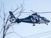 A police helicopter is currently conducting a search in the Warrnambool foreshore area.