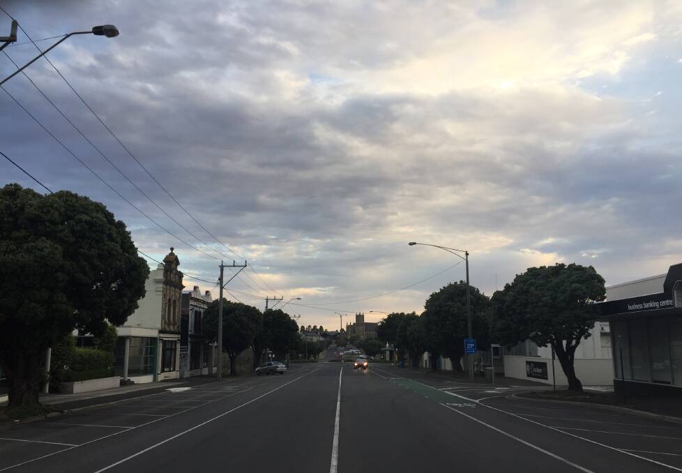 Warming up: The scene up Warrnambool's Kepler Street just before 7am.