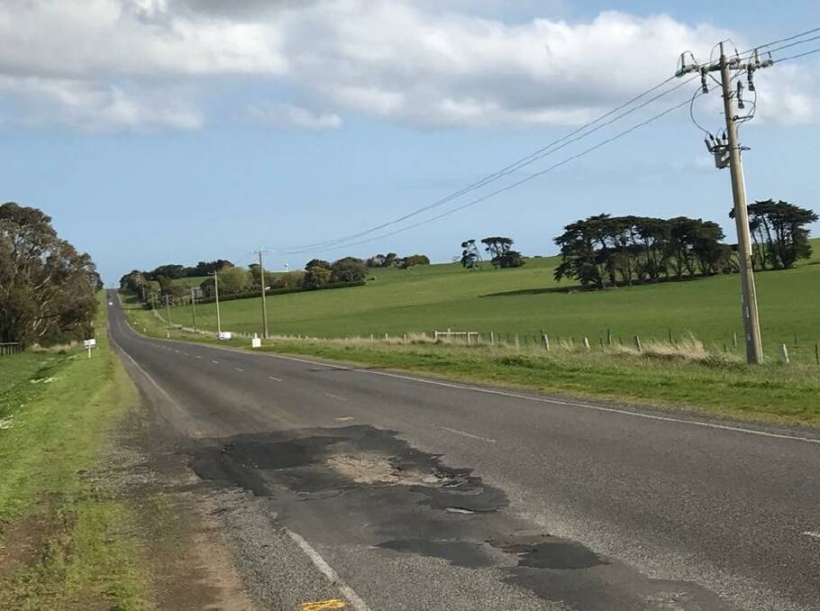 Calls made: The huge pothole at the south end of the Warrnambool-Caramut Road which has now been patched.