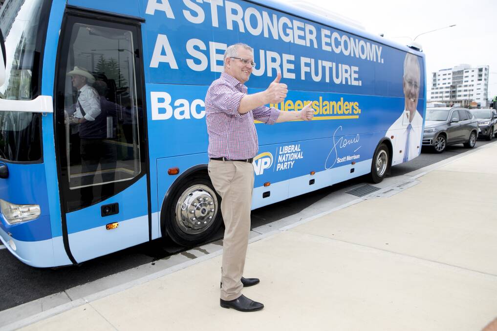 On the road: Prime Minister Scott Morrison at the announcement of stage three of the Gold Coast light rail on Monday.  He's on a four-day tour but thinking about two federal elections next year.