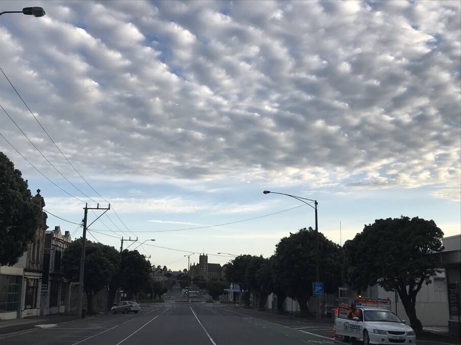 Cloudy, very cloudy: Looking north up Warrnambool's Kepler Street at 6.45am. Warrnambool is expecting a top of 25 degrees.