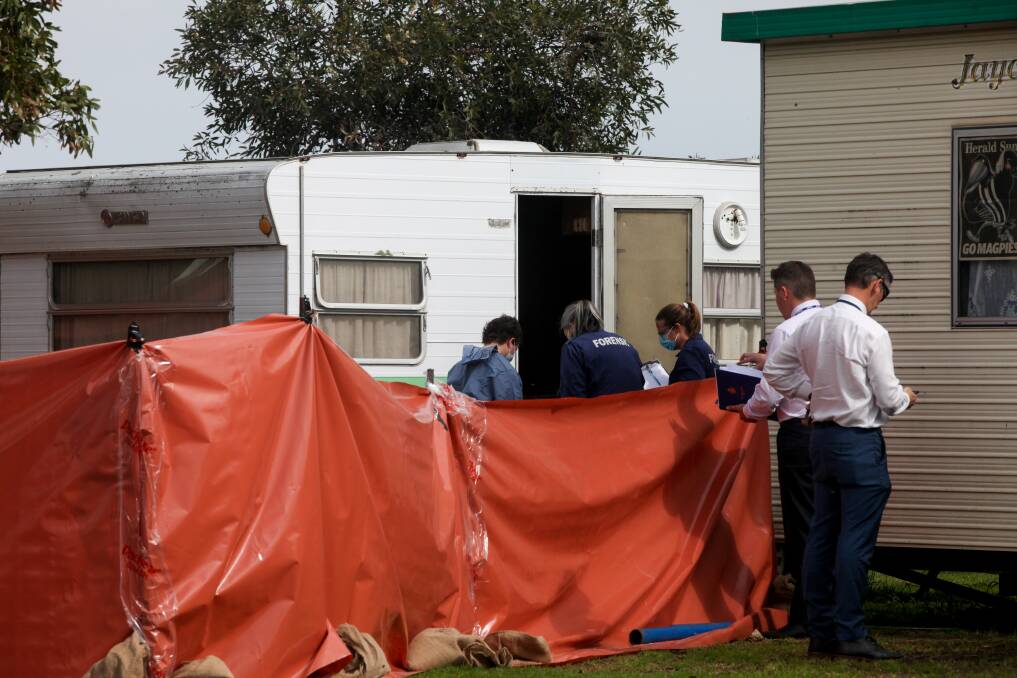 Collecting evidence: Victoria Police forensic services officers examine the scene at Port Fairy on Friday, September 20, 2019, alongside homicide squad detectives. Picture: Rob Gunstone