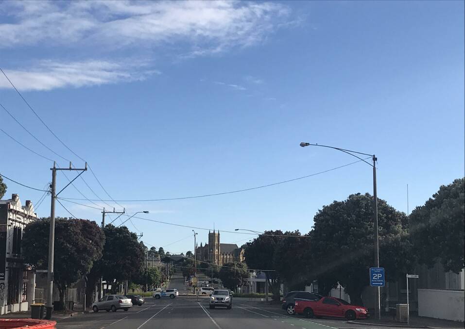Warm ahead: Looking north up Warrnambool's Kepler Street at 7.30am. The city is expecting a top of 36 degrees today.