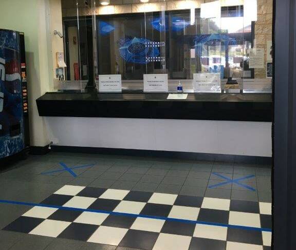 Social distancing guides: Markings have been put in place at the Warrnambool police station foyer for the public.