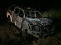 Ignited: The stolen and torched Toyota HiLux ute worth $50,000 was carrying tools and equipment worth another $20,000. 