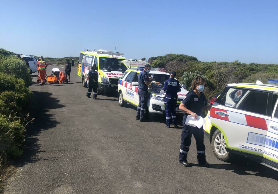 Rescue: Emergency service personnel attend at The Grotto on Thursday afternoon. 