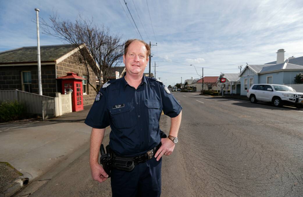 On the job: Koroit police Sergeant Pat Day raised the alarm after seeing a fire early Friday morning while walking to work.