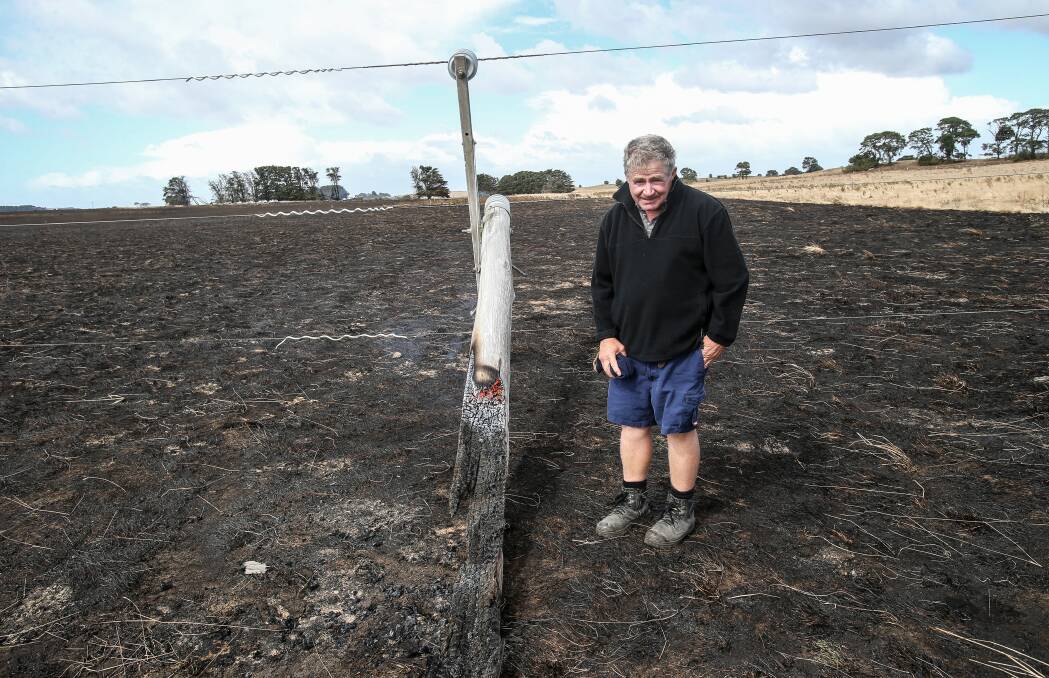 Long road to recovery: The Sisters dairyfarmer Jack Kenna with the pole that snapped and caused a bushfire.