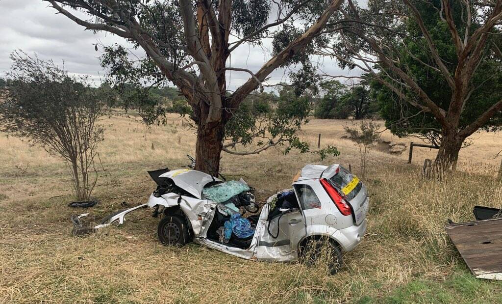 The roof of the Ford had to be cut off after the driver was 'vacuum sealed' after colliding with the gum tree. She is in a critical condition.