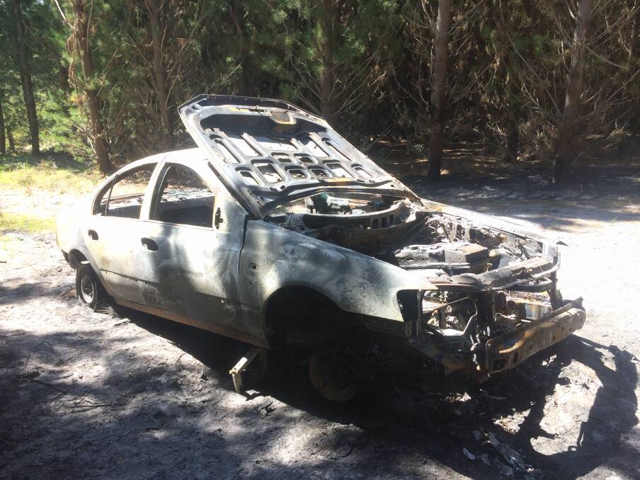 Gone: Jessica Longmore's completely destroyed 2007 Ford sedan was torched near Winnap on the Portland-Nelson Road.