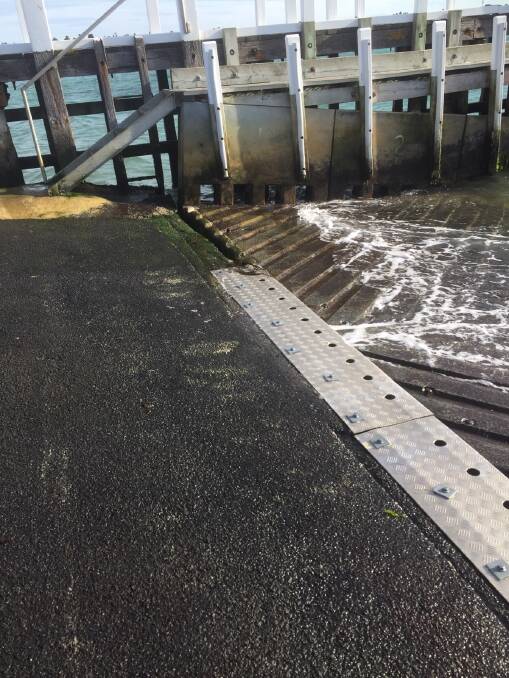 Gone again: The section of the Warrnambool harbour boat ramp where the metal cover was ripped off again after emergency repairs last week.
