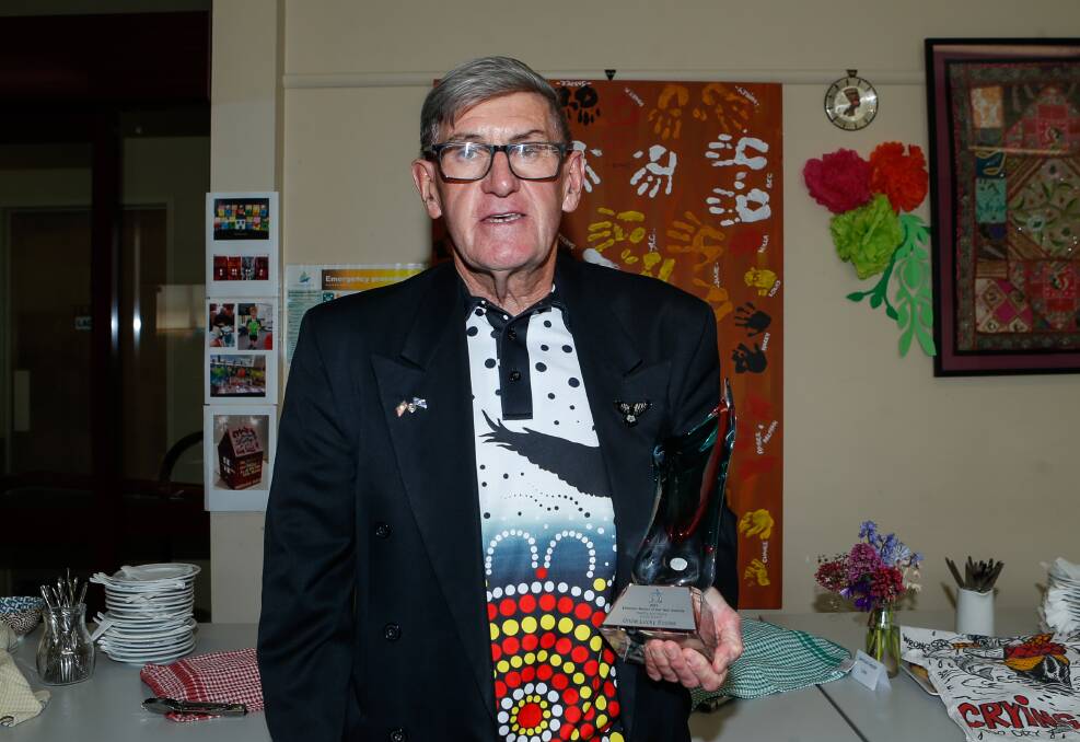 Warrnambool's Robert Eccles with his 2021 Victorian Healthy and Active Living Award. He has been charged with sex offences.