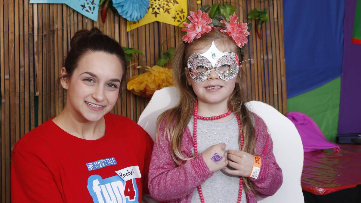 Rachel, pictured with Lucinda Bourke, volunteered at this year's Fun4Kids Festival and is now studying to be a school teacher. Picture: Vicky Hughson