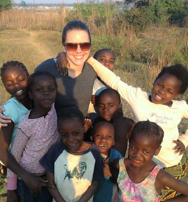 SUPPORT: Simone Younger with some of her former students in Zambia.