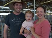 STEER SELLERS: Carl and Steph Walder, with 15-month-old Georgie, Heathmere, sold 75 head of cattle.