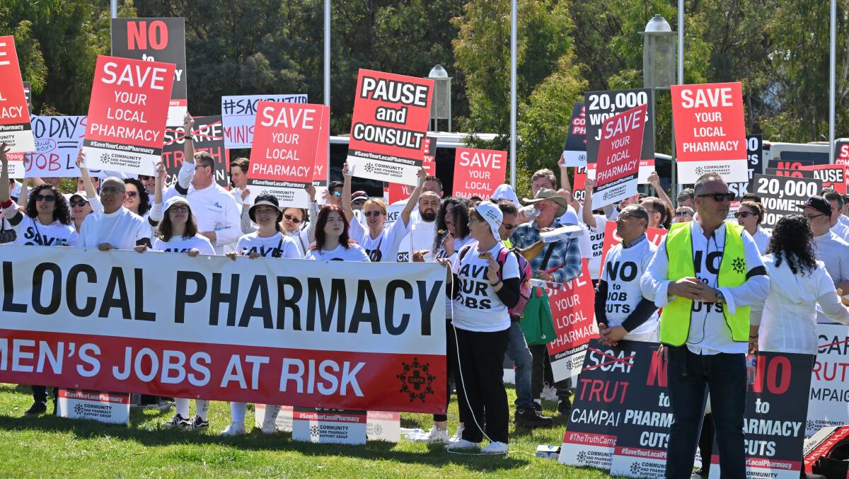 The Community and Pharmacy Support Group protest in front of Parliament House on Monday. Picture by Justine Landis-Hanley