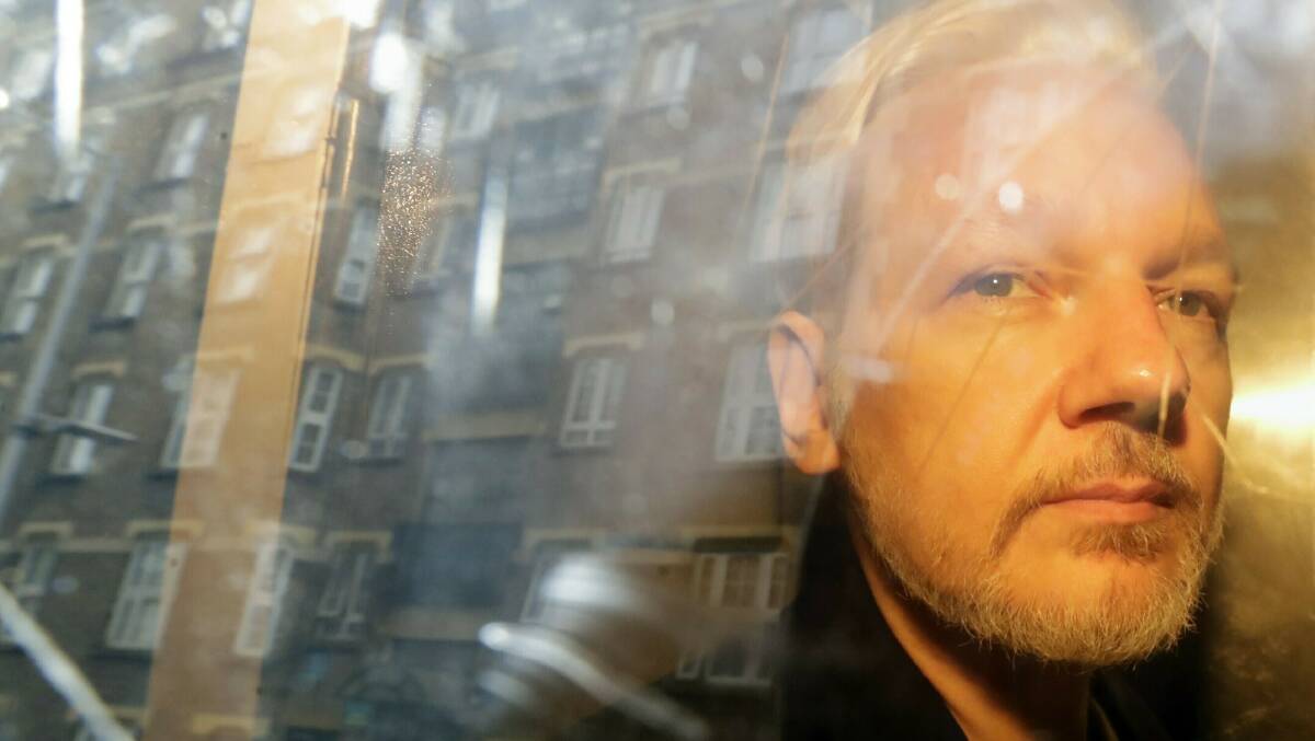 WikiLeaks founder Julian Assange is taken from court in London, Wednesday May 1, 2019. Picture: AAP