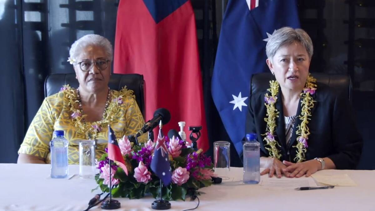 Australian Foreign Minister Penny Wong, right, holds a joint press conference with Samoan Prime Minister Fiame Naomi Mataafa in Apia, Samoa, last Thursday. Picture: AAP