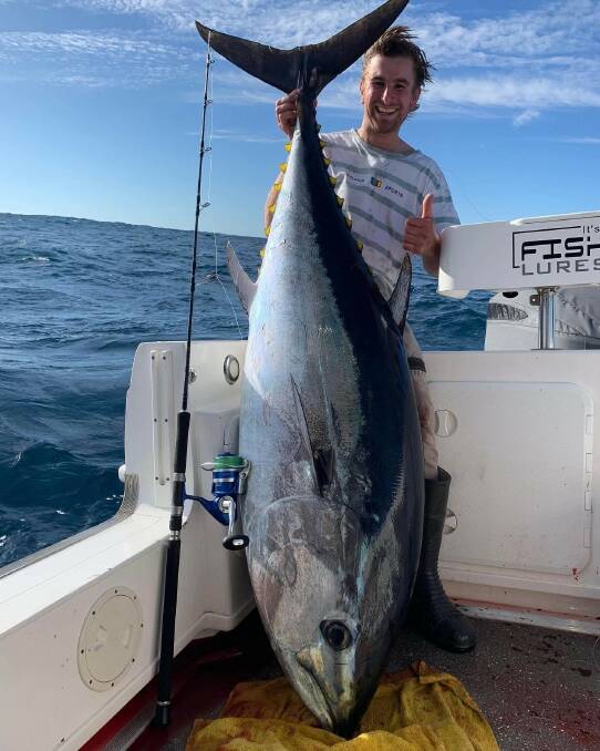 LONG AND SHORT OF IT: A great capture at Port Mac by Lewie Holland. who caught a 113kg barrel on spin gear. This fight took two hours, which shows just how stubborn this fish was.