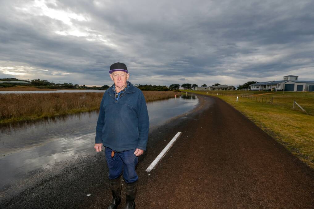 FLOOD: Narrawong farmer Owen Roberts said the height of the river reached 1.9 metres this year, submerging a road leading to a caravan park. Picture: Anthony Brady. 