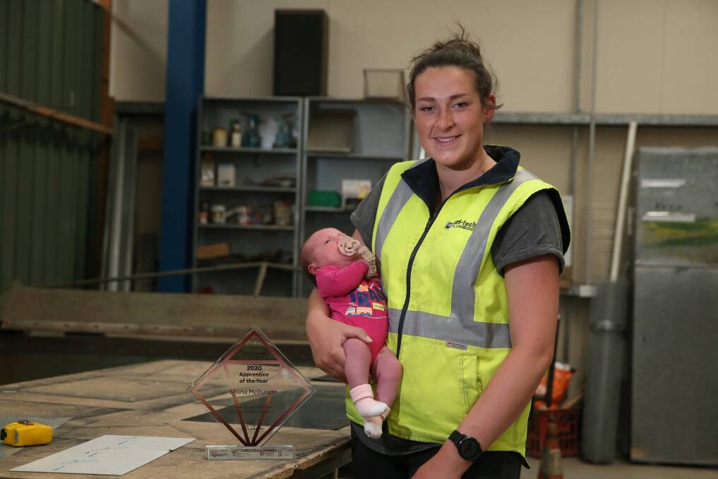 ROLE MODEL: Cri-tech Plumbing Services's Shona McGuigan with three-week-old daughter Poppy after receiving Victoria's Apprentice of the Year. Picture: Mark Witte
