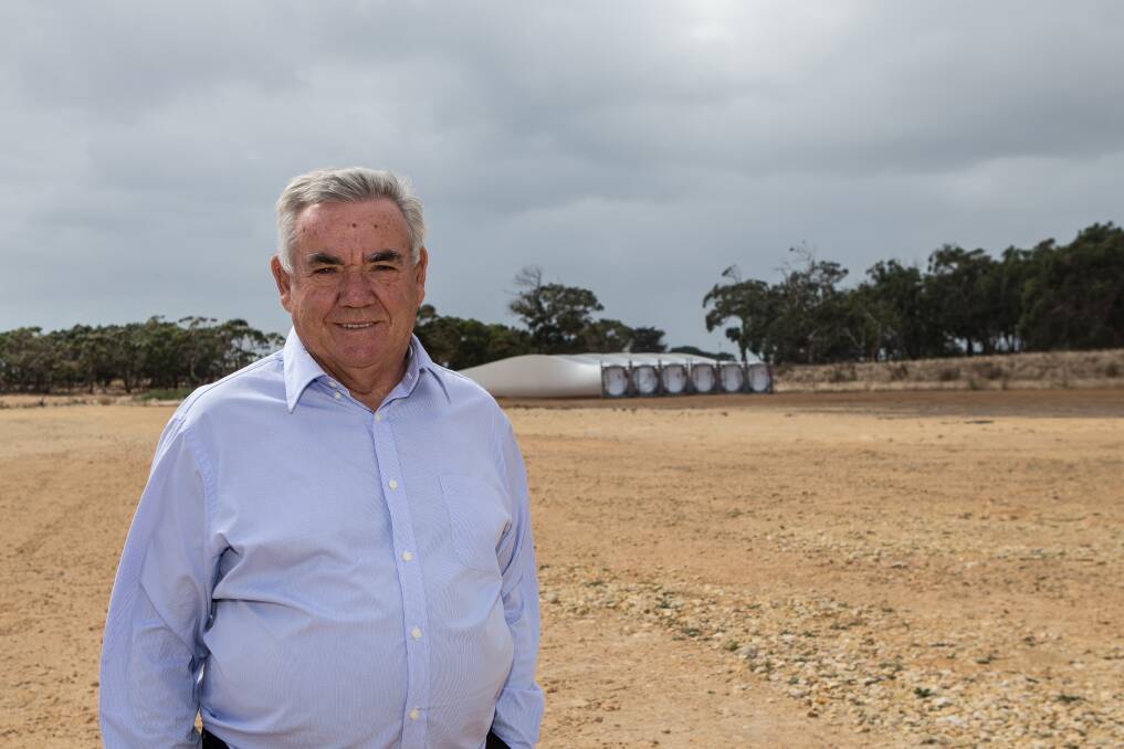 LOCAL WORK: Steve Garner is calling for the federal government to step in and guarantee Australian manufacturers receive work at wind farms. He's pictured with blades at Keppel Prince, Portland. 