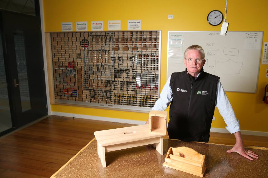 STAYING HANDS-ON: Cobden Technical School principal Rohan Keert with some of the bolster wood projects. The school has assigned the projects to some students at home. Picture: Mark Witte