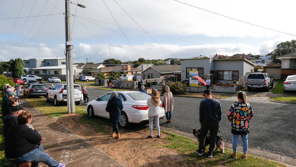 Crowds showed up to a Patricia Street auction on Saturday, where six bidders vied for the property. Picture: Anthony Brady