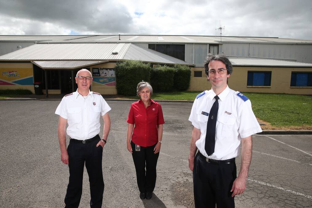 'BITTERSWEET': The Salvation Army's Brett and Sally-Anne Allchin and Chris Philpot. The service predicts a drop in welfare payments could make it more difficult for some people to find employment. Picture: Mark Witte