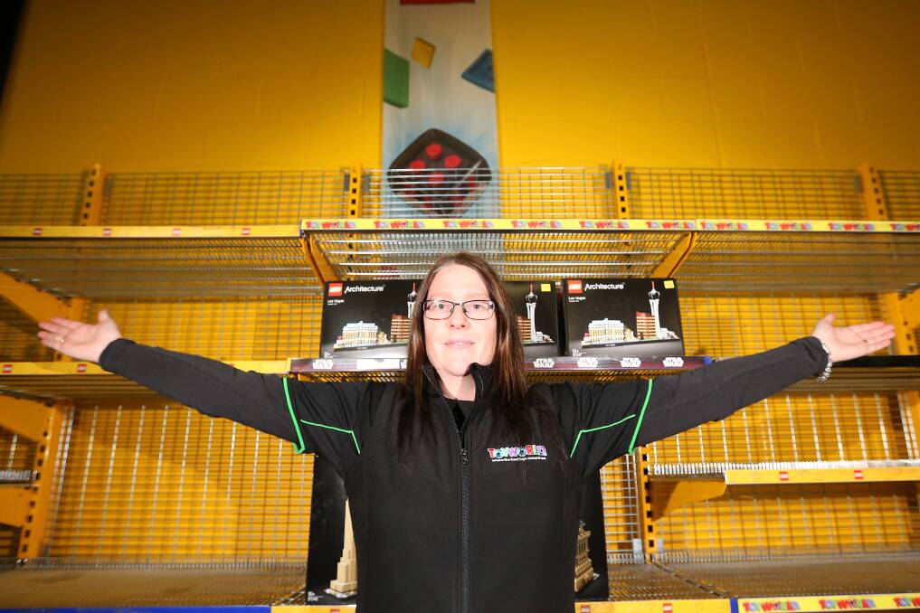 RUNNING LOW: Warrnambool's Toyworld employee Leisha Neave with limited stock on the shelves. Picture: Mark Witte