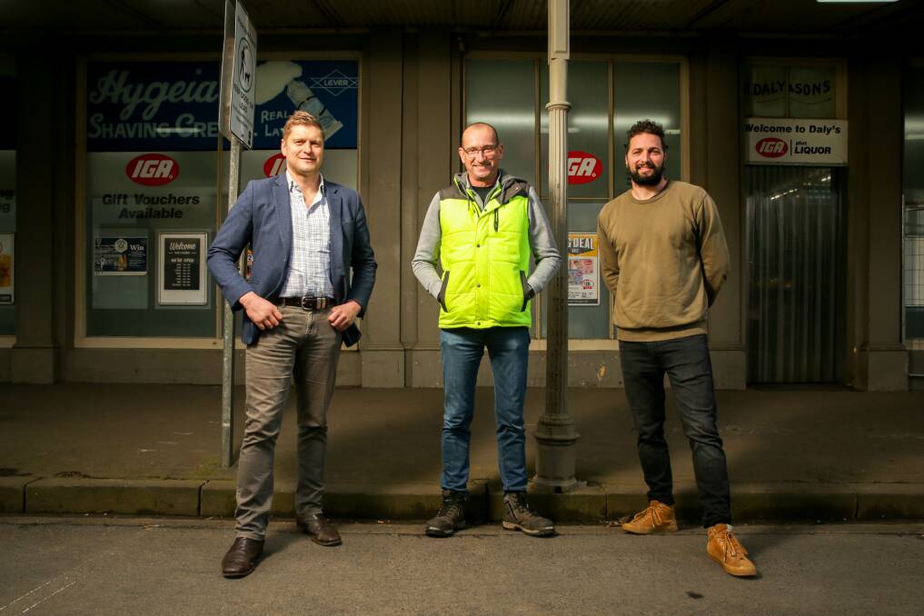 Moyne Shire mayor Daniel Meade, Koroit Daly IGA owner Peter Daly and Koroit and District Progress Association president Sam Rudolph. Picture: Chris Doheny