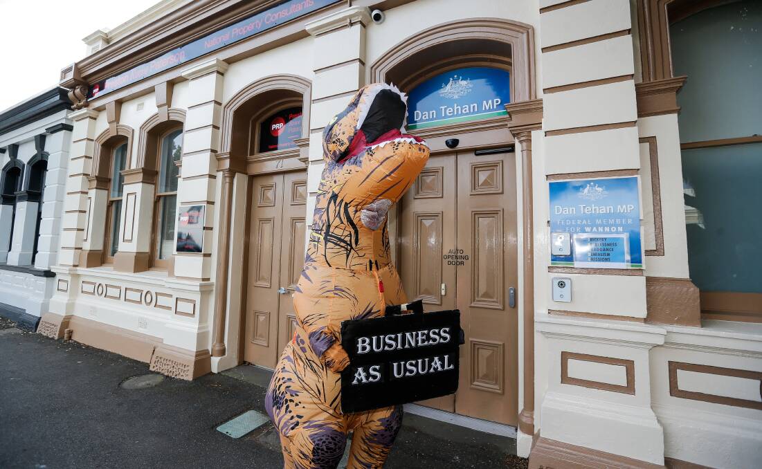 The business as usual dinosaur outside Wannon MP Dan Tehan's Warrnambool office. Picture: Anthony Brady