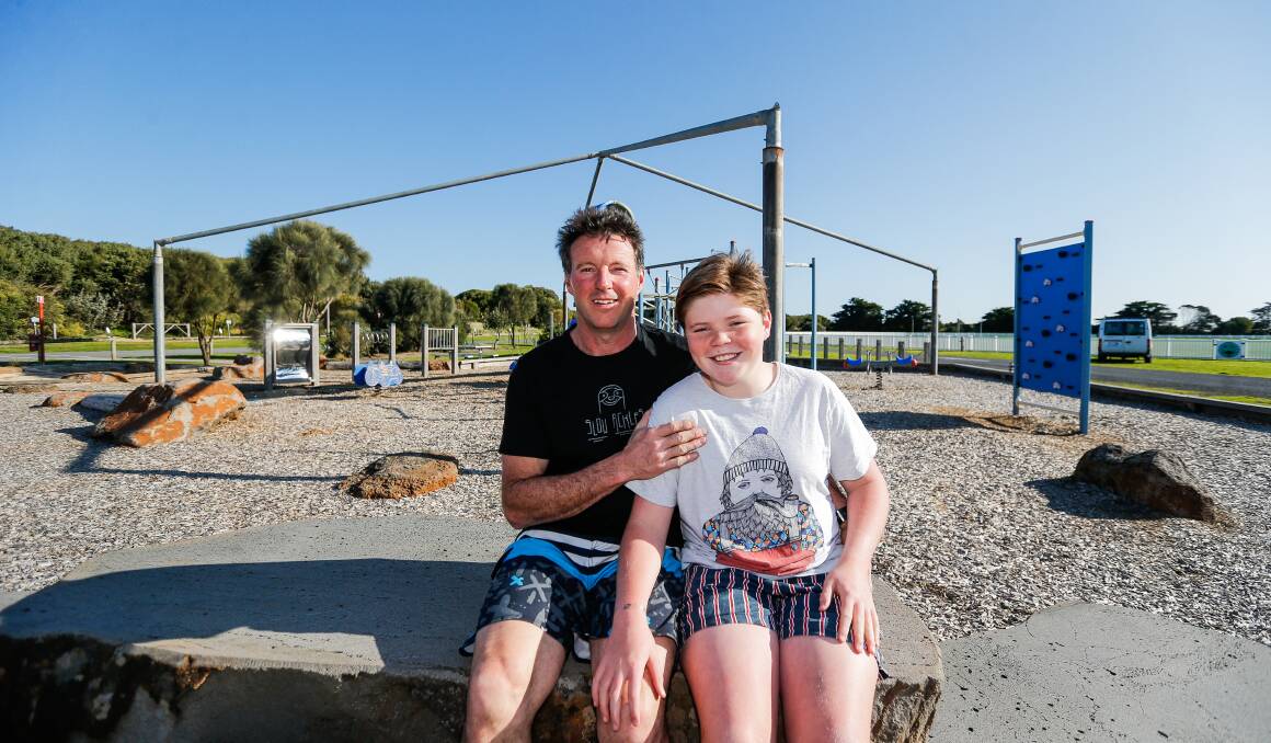 HONOURED: Anthony Dixon has won the Rotary Club of Warrnambool's father of the year for 2021 after being nominated by son Jerry Dixon, 11. They are pictured at the Killarney Recreation Reserve, where Anthony volunteers. Picture: Anthony Brady