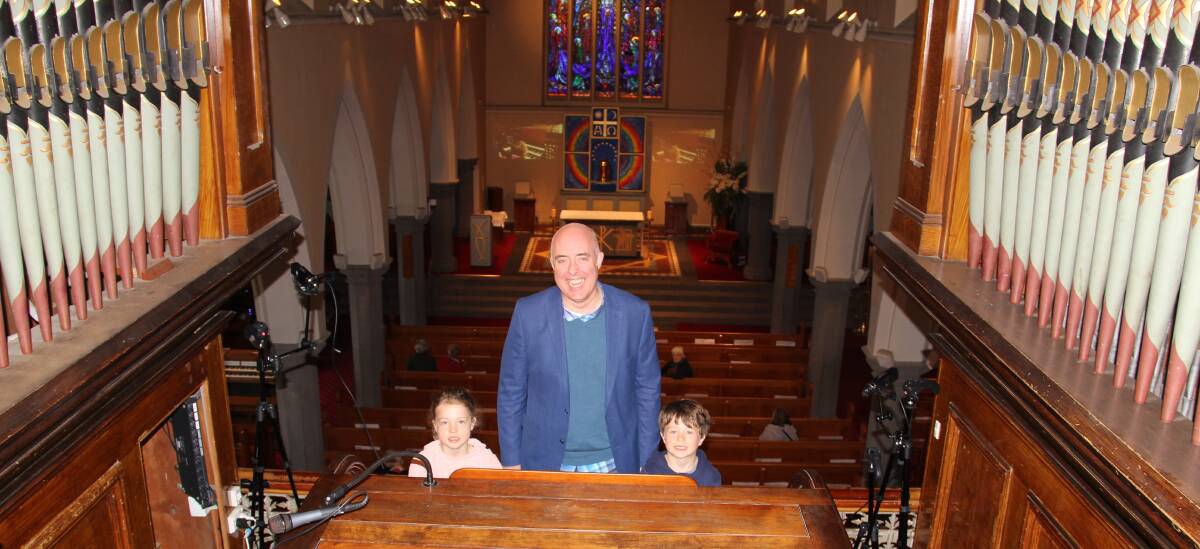 MEETING THE BEST: Eva Wear, 8, and Henry Wear, 6, from Hamilton, with internationally acclaimed concert organist Thomas Heywood.