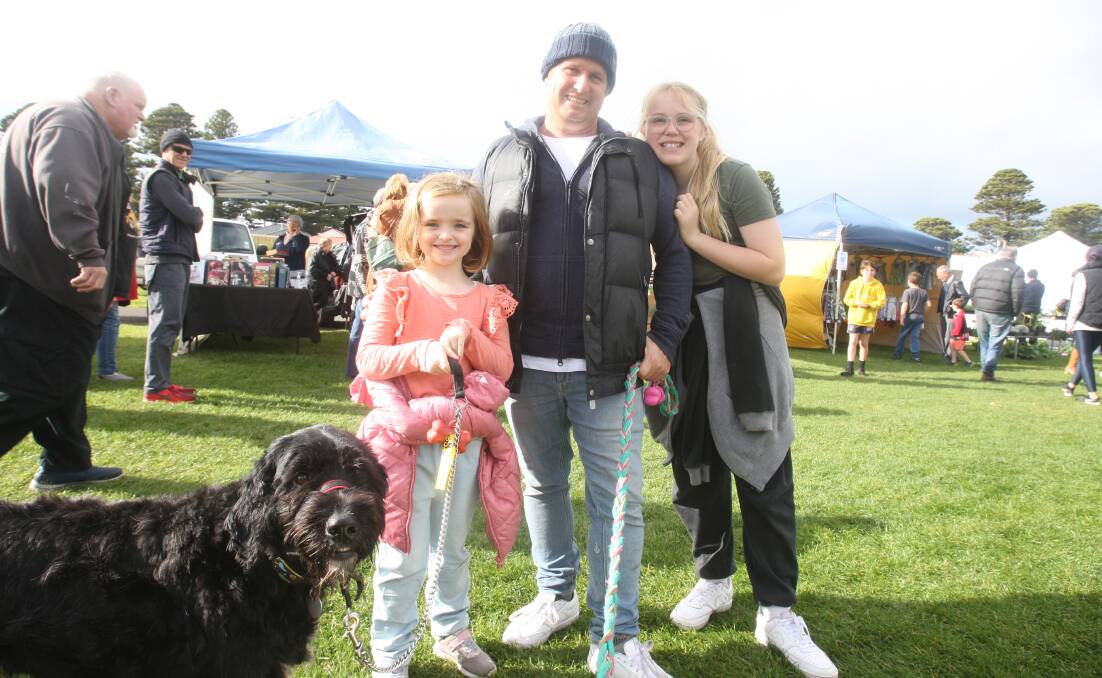 FAMILY: Maeve, 6, Keith and Kitty Curtain visit the Port Fairy Community Market stalls. Picture: Jackson Graham