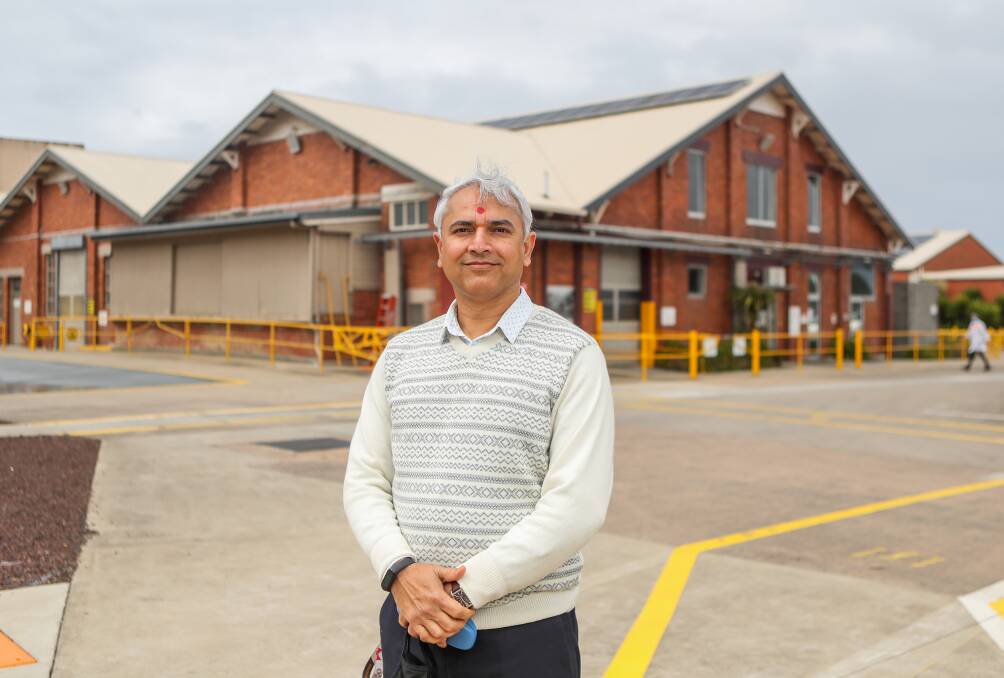 DECADES OF INNOVATION: Sun Pharma chief financial officer Urvish Bhavsar standing with a 1920s building that once collected milk in the plant's early days. Picture: Morgan Hancock