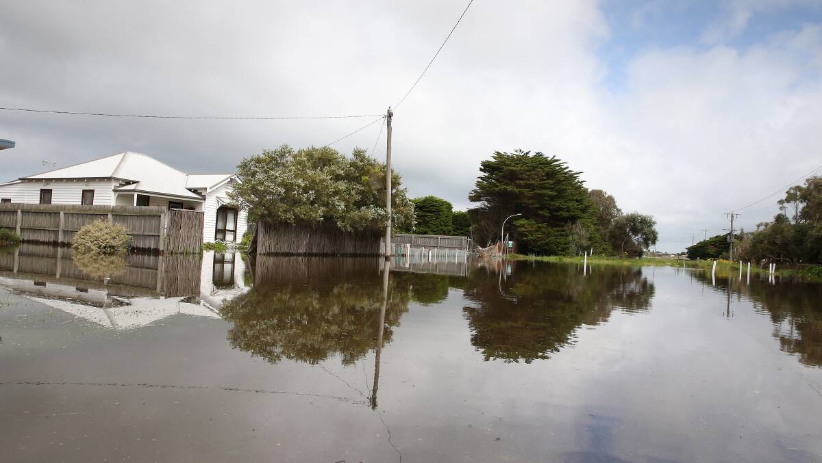 Scenes of flooding in Port Fairy on Saturday. Emergency services claimed the event was a 'one-in-fifty-year flood'. Picture: Mark Witte